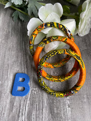 KITA HANDMADE AFRICAN ORANGE BANGLES SET OF 3